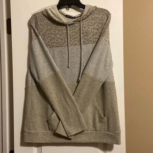 not my style, very soft, 68% polyester, fits a tiny bit small